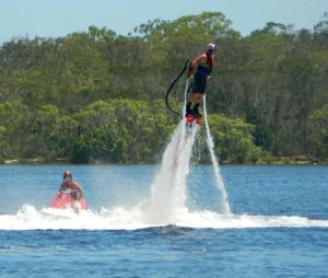 Flying through the air, out of the water...awesome! 